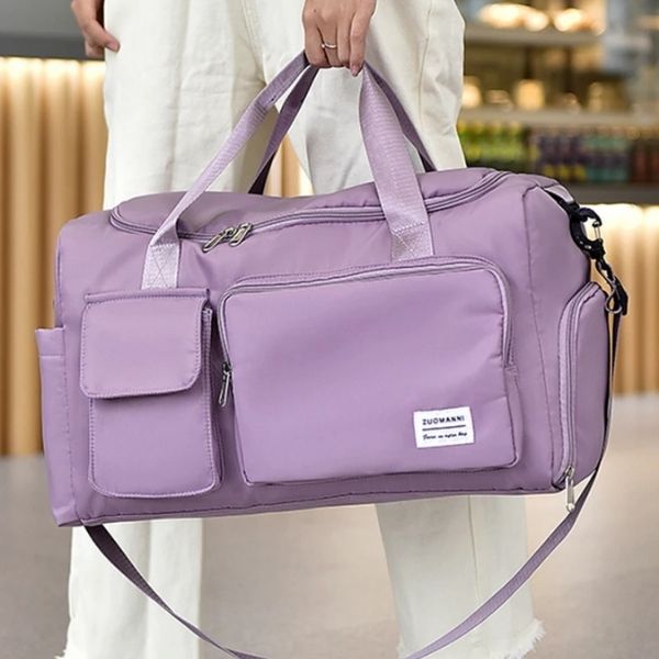 sac de voyage femme - sac de voyage - sac de voyage bandoulière - sac de voyage femme bandoulière - sac de voyage avec compartiment chaussures - sac bandoulière - sac de voyage cabine - sac de voyage avion - sac bagages à main - VoyagerZen -