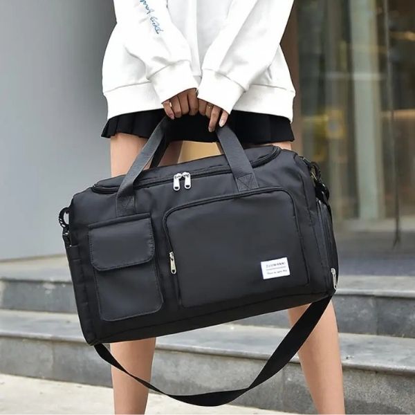 sac de voyage femme - sac de voyage - sac de voyage bandoulière - sac de voyage femme bandoulière - sac de voyage avec compartiment chaussures - sac bandoulière - sac de voyage cabine - sac de voyage avion - sac bagages à main - VoyagerZen -