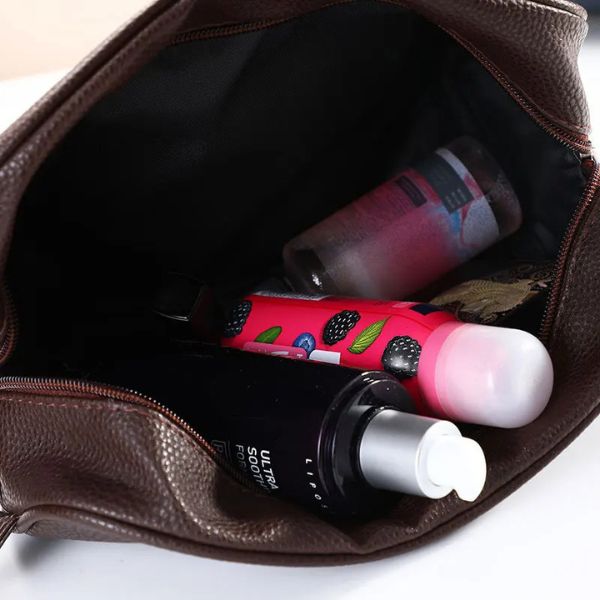 trousse de toilette - trousse de toilette de voyage - trousse de toilette voyage - trousse de toilette femme - trousse de toilette homme - tousse de toilette avion - tousse de toilette cabine - trousse de toilette imperméable - trousse de toilette en cuir PU -